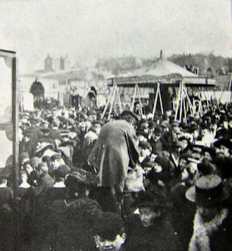 Crowds and roundabout at The Sands Easter Fair 1904 - 32kB jpg